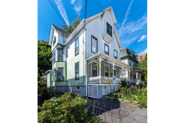 View of front of property featuring covered porch