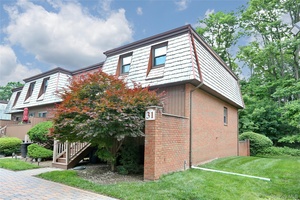 Heart of New City ! Just off Main Street, this spacious condo offers three levels of comfortable living with a layout perfect for both relaxing and entertaining.