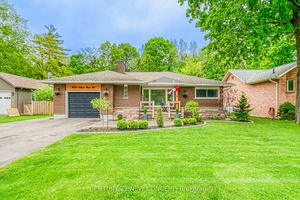 Beautiful All Brick Bungalow On Huge, Fully Fenced Mature Lot !