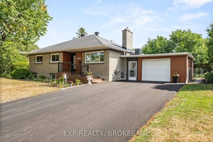 Beautifully updated 3 1 bedroom, 2 bath bungalow tucked away in the sought after Alta Vista neighbourhood.