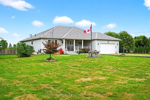 Custom built in 2012, this Campden bungalow blends quality construction with modern comfort on a 1 acre lot.