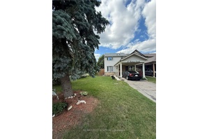 Absolutely stunning corner townhome in the sought after Heart Lake community !