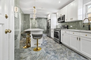 FHA amp ; Conventional loans welcome Stunning Renovated Colonial near Garden City.