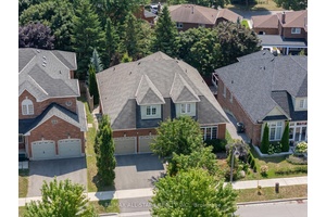 Nestled on a lush 54 x 101 foot lot in a peaceful, family friendly neighbourhood, this exceptional bungaloft presents approximately 5, 000 square feet of finished living space that combines ...