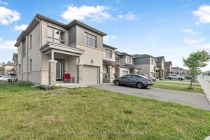Welcome to this stunning end unit corner townhouse offering over 2, 000 sq.