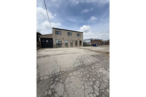 Freestanding building with outside storage in prime Mississauga location.