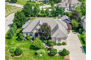 Experience unparalleled comfort and luxury in this stately custom built executive bungalow, this rare gem spans over 6, 600 sq.