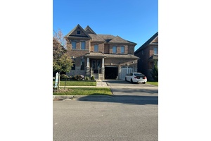 One of a kind Home with custom design changes including Butler's Pantry, undermount sink, wall mount pot filler over gas stovetop.