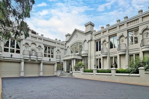 Welcome to a sophisticated residence in the prestigious Woodland Acres community, offering an approximate 10, 000 sq.