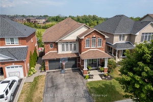 Spacious, two storey, four bedroom home, with separate entrance, is ideally located close to amenities and Hwy 401.