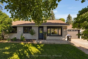 Surrounded by expensive homes this adorable ranch all brick bungalow not garage was renovated 2021 and has a huge usable backyard with tons of trees and privacy !