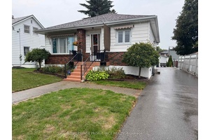 Charming Bungalow with In Law Suite amp ; Oversized Lot !