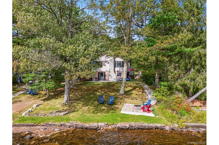View from above of property with a large body of water