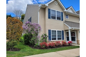 Welcome to Carefree Living in this Vibrant 62 or Better Gated Development with LOW.