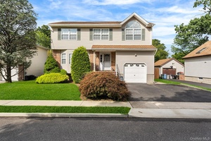 Discover this spacious and well appointed home in North Bellmore, offering a blend of comfort and convenience.