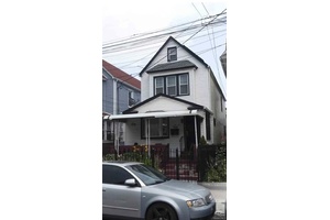This updated two family home is great for families or investors.