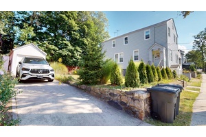 Two Family with Bonus Basement Room.