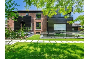 Situated on a tree lined street near Mimico Creek, this custom residence in prestigious Sunnylea was designed and built by an architect for his own family.