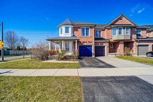 Stunning Freehold End Unit Corner Town Home Located In Sought After North Whitby Community.