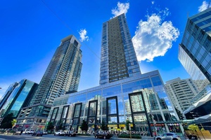 Bright and spacious corner unit with unobstructed view of lush greenery.
