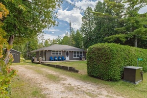 DESIRABLE NORTH SAUBLE BEACH HOME OR COTTAGE on Huron Ave !