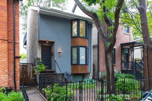 This exceptional detached residence combines striking architectural design with thoughtful functionality, offering a quiet retreat just steps from Riverdale Park.