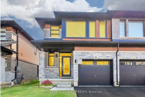 Discover this stunning brand new end unit townhome in the beautiful city of Paris !