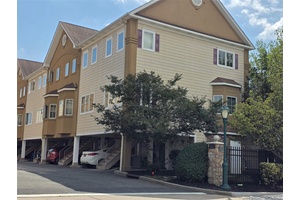 MAPLE SQUARE TRIPLEX TOWNHOUSE.