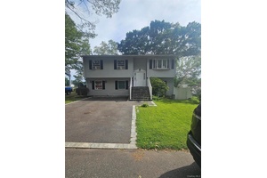 Nice High Ranch with 6 Bedrooms, 2 Full Baths, Livingroom, Dinning room, Cathedral Ceilings, 2 Skylights, parking space up to 7 cars.