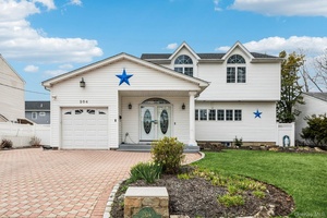 Welcome to 204A Broadway, a standout colonial in the heart of Massapequa Park with a true mother daughter setup that s rarely found.