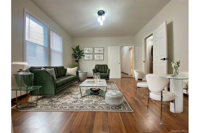 Living room featuring wood finished floors