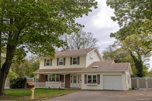 BACK ON THE MARKET ! ! due to a death in the family This fully and beautifully renovated home boasts 5 bedrooms and 4 baths !
