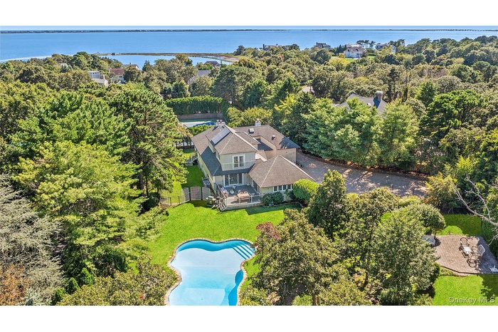View of subject property with a nearby body of water