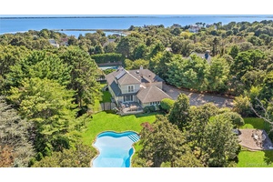 Situated South of the highway, in the prestigious Sandringham Beach community, this recently built and beautifully finished contemporary home has it all !
