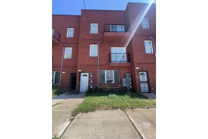 DON'T MISS THIS EXTRA LARGE FULLY RENOVATED BRICK STUCCO 3 FAMILY.