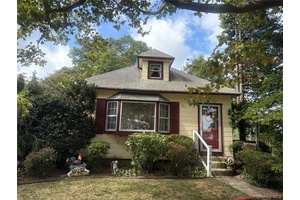 This quaint home sitting on an oversized lot provides great opportunity to expand if desired.