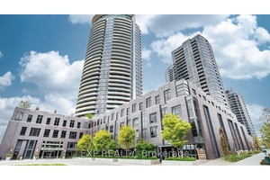 Luxurious 2 bed, 2 bath condo with 9' 0 Ceilings, stylish features like floor to ceiling windows, laminate floors and stainless steel appliances in the modern kitchen.