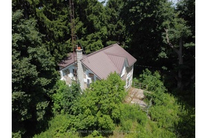 This rare scenic 83 acre property located just south of Highway 401 and the Village of Moffat, and north of Campbellville on a paved road.