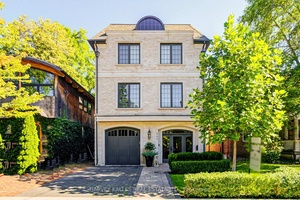 This exceptional custom home, built by the renowned Park Avenue Fine Homes, combines timeless elegance with modern sophistication on a rare lot backing directly onto Cedarvale Park.