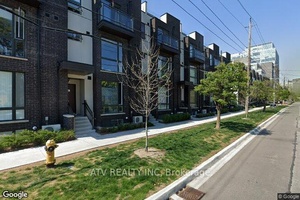 Two Story Stacked Condo Townhouse Facing Quiet Residential Neighborhood.