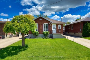 Beautiful Brick Bungalow in Move In Condition !