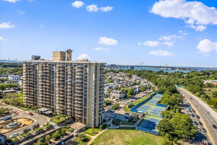 Drone / aerial view of a notable bridge and a large body of water