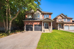 This impressive custom designed 2 car garage detached home is a mere 7 years old and showcases an attractive 50 ft frontage along with over 2667sq ft above ground.