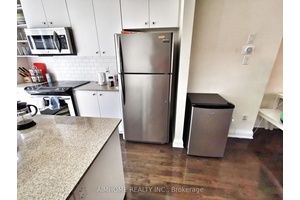 Immerse yourself in the epitome of luxury living with this exquisite corner executive suite located in the heart of the vibrant downtown entertainment district.
