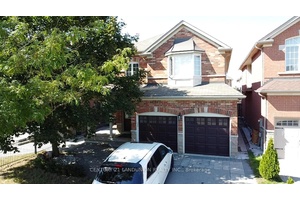 A Beautifil Detached 4 Bed, 4 Bath and 2 Garage Model Home Located in the Top Ranked School Zone !