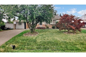 Charming Bungalow on a Rare 75 Ft Wide Lot !