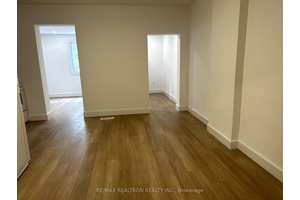 Price Negotiable. Massive, Newly Renovated 1 Bed, 1 Bath Main Level Apartment At Gerrard East And Greenwood behind commercial unit.
