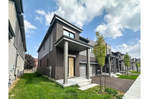 This newly built corner unit offers a bright and spacious open concept layout, perfect for modern living.