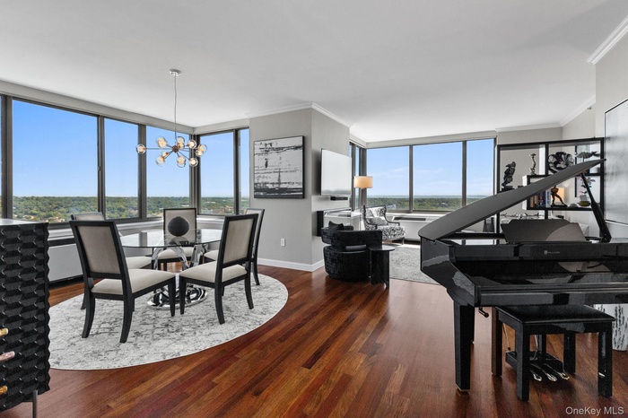 Welcome to The Tower at City Place, Residence 30H — a high-rise sanctuary where sophisticated design meets breathtaking skyline views in the heart of