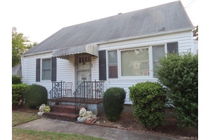Bring your vision and make this classic Cape Cod style home your own !